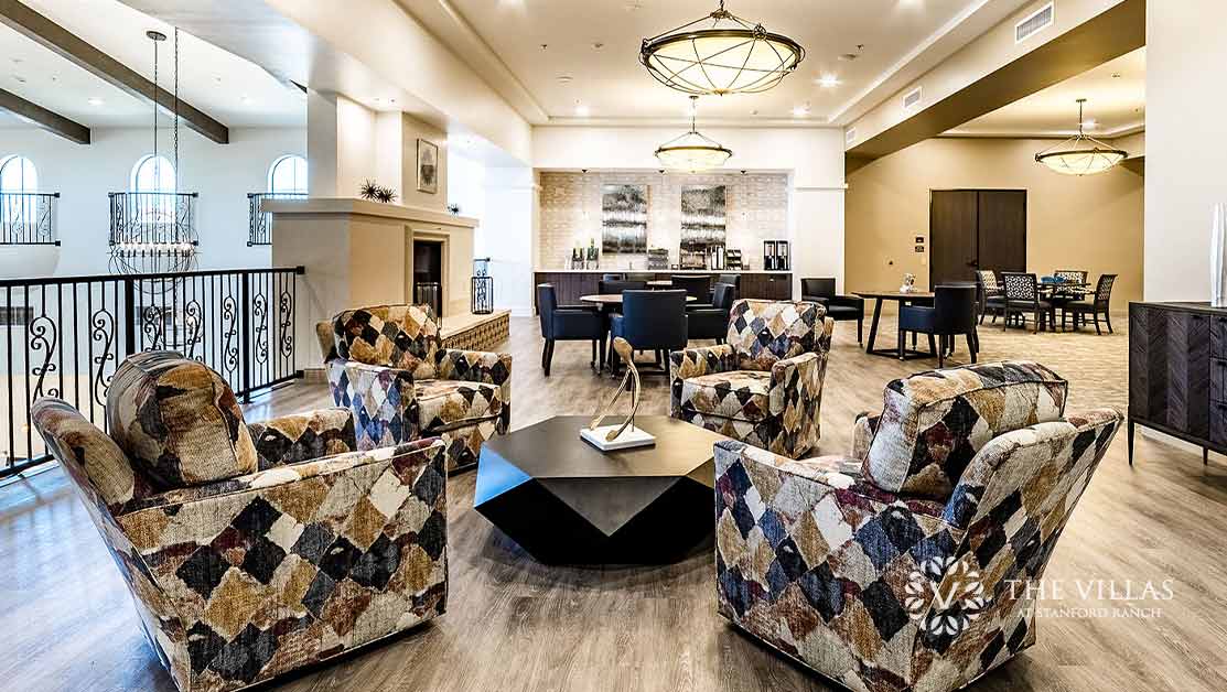 A beautifully decorated gathering area, one of the many luxury senior living amenities at The Villas at Stanford Ranch.